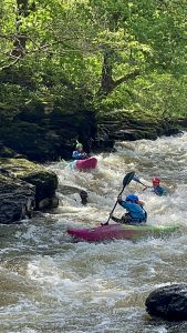 Paddling on Serpents tail on the River dee with Paddlesports Coaching 
